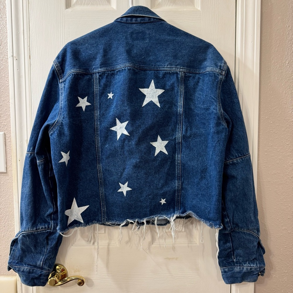 Calvin Klein distressed denim jacket Large with star
